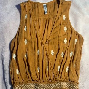Mustard yellow cropped shirt